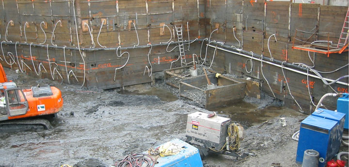 Construction excavation with dual level vacuum well point system